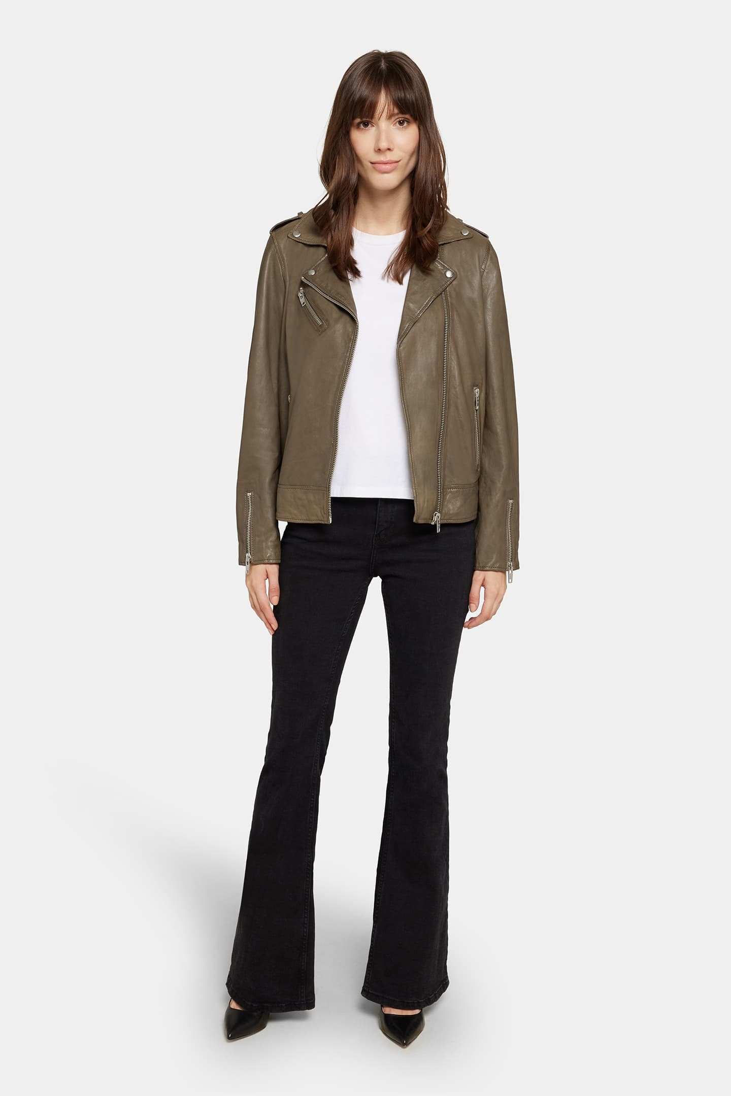 Model wearing the Yaya leather jacket in dusty olive, front view with arms relaxed by her sides.